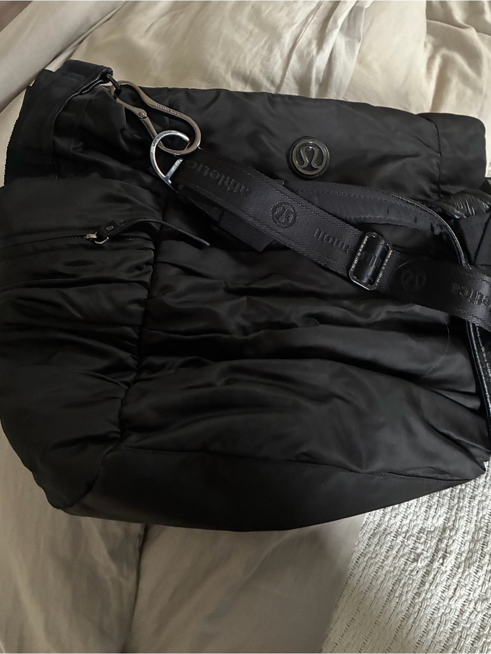 lululemon athletica Black Quilted Messenger Bag with Branded Strap